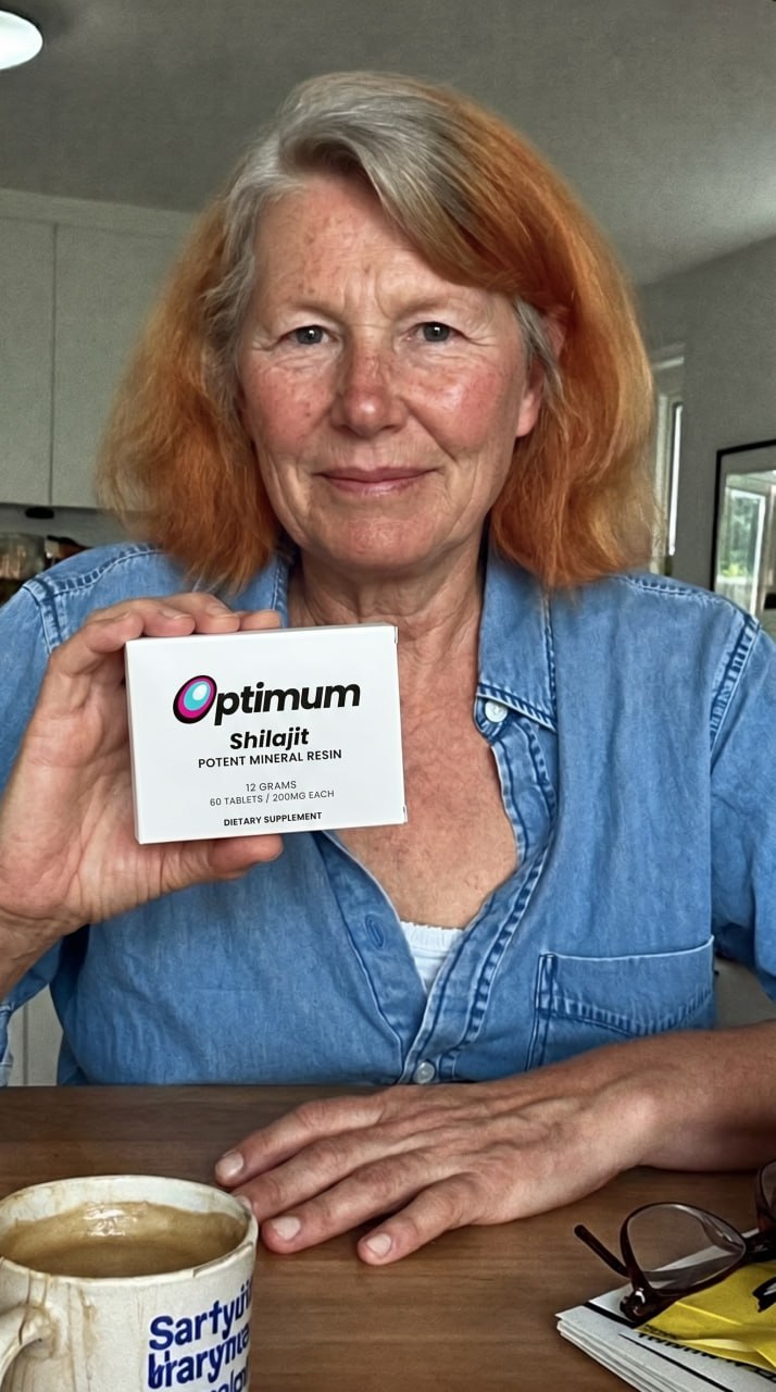 Donna K., verified Optimum customer holding the box